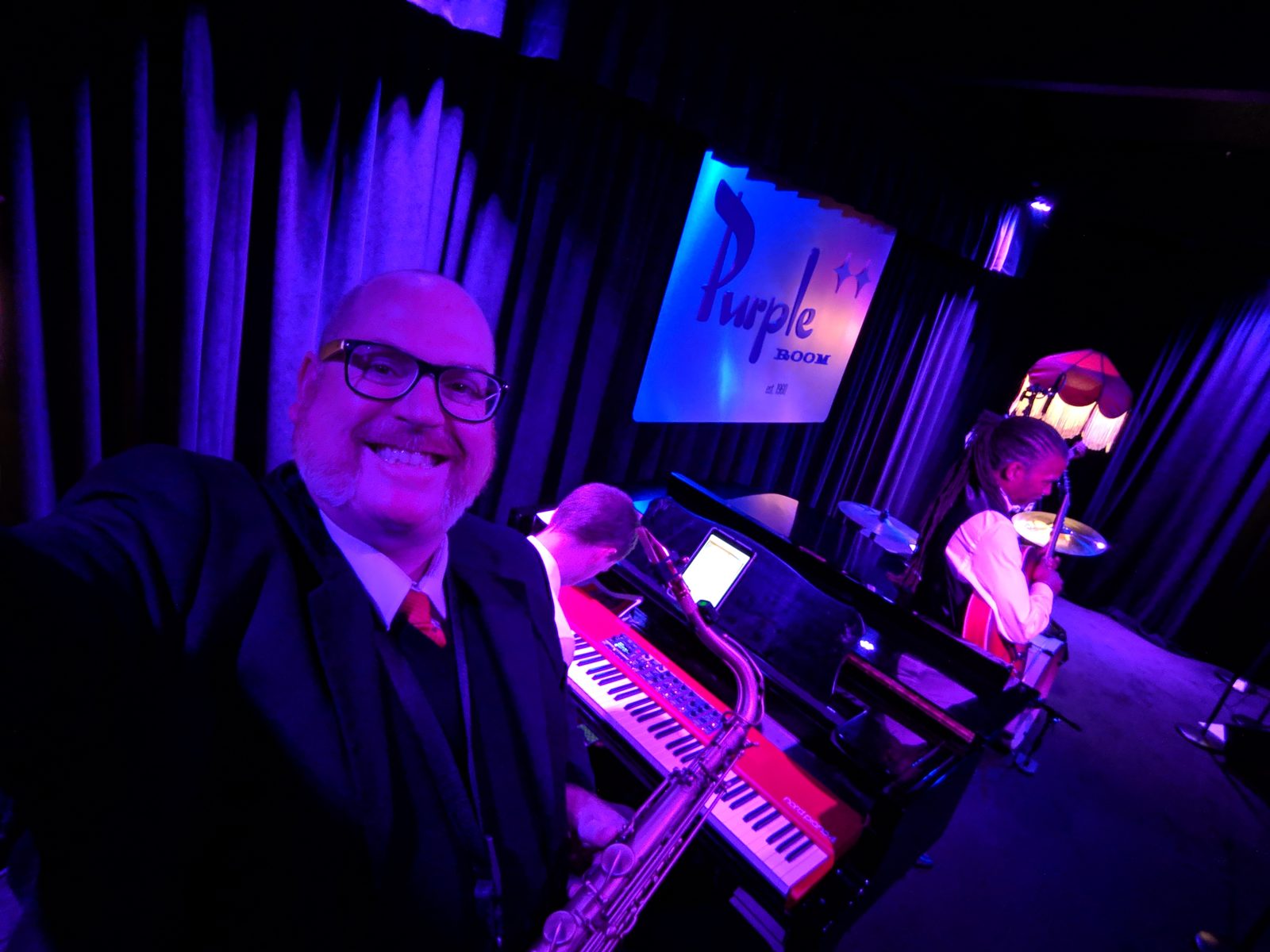 Steve Wilson at the keyboard and sax rig in a club