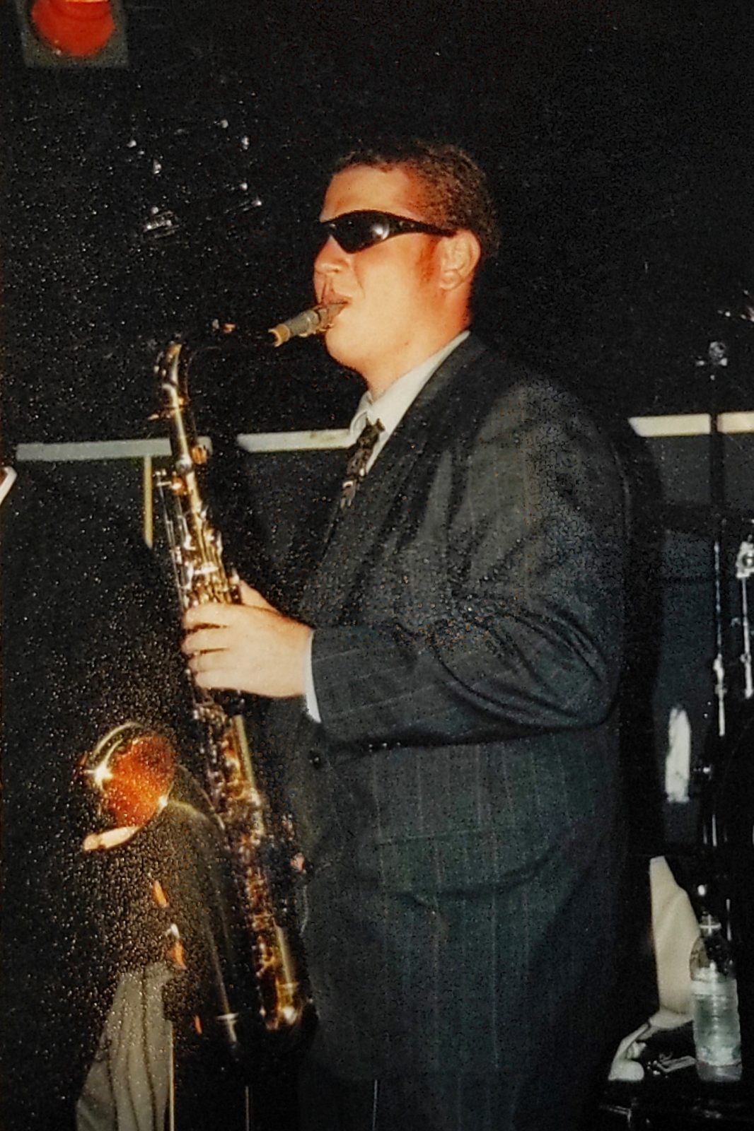 Steve Wilson soloing on tenor saxophone in a dark club
