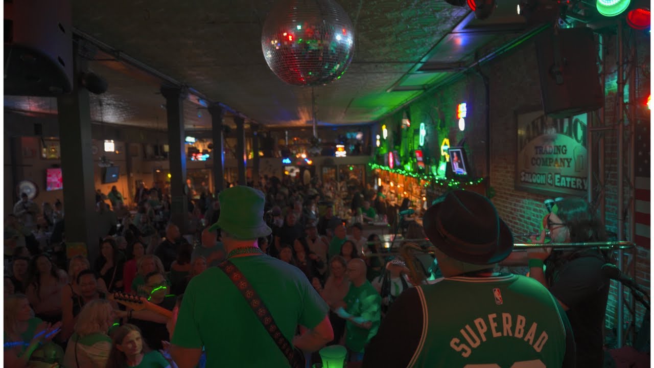 Crowd under a disco ball at the Superbad reunion show